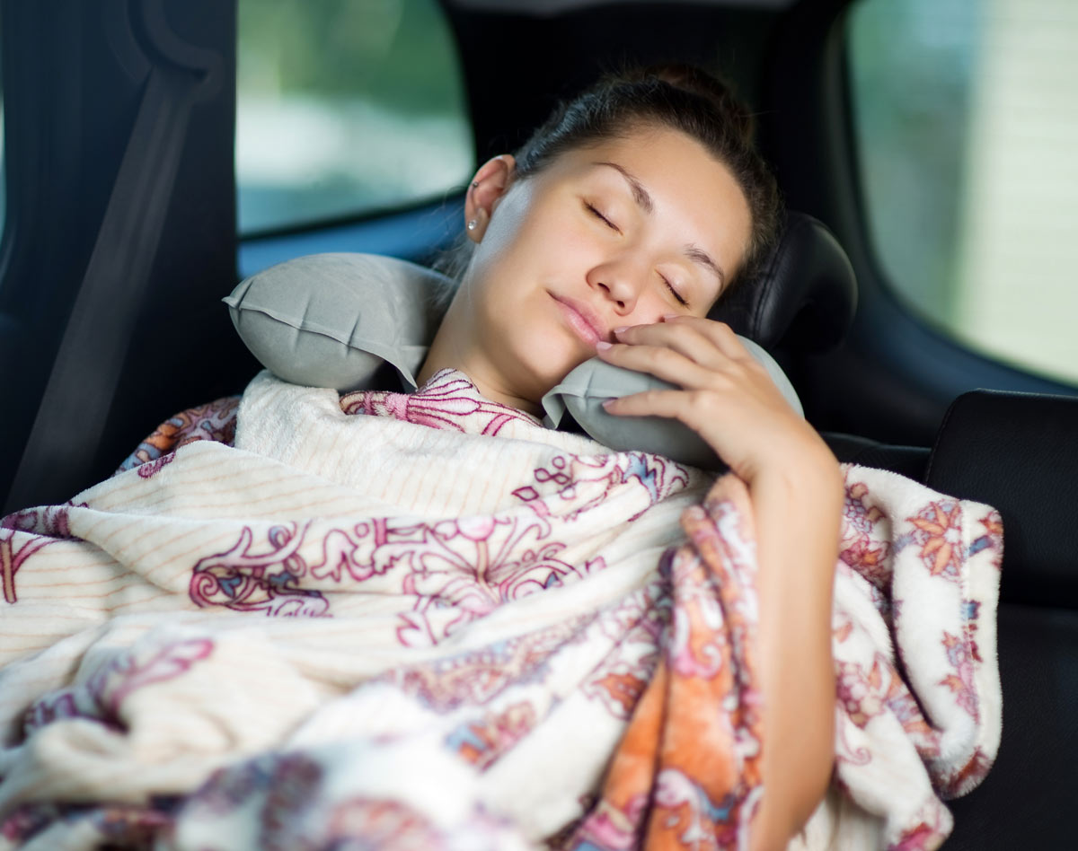woman sleeping in the car