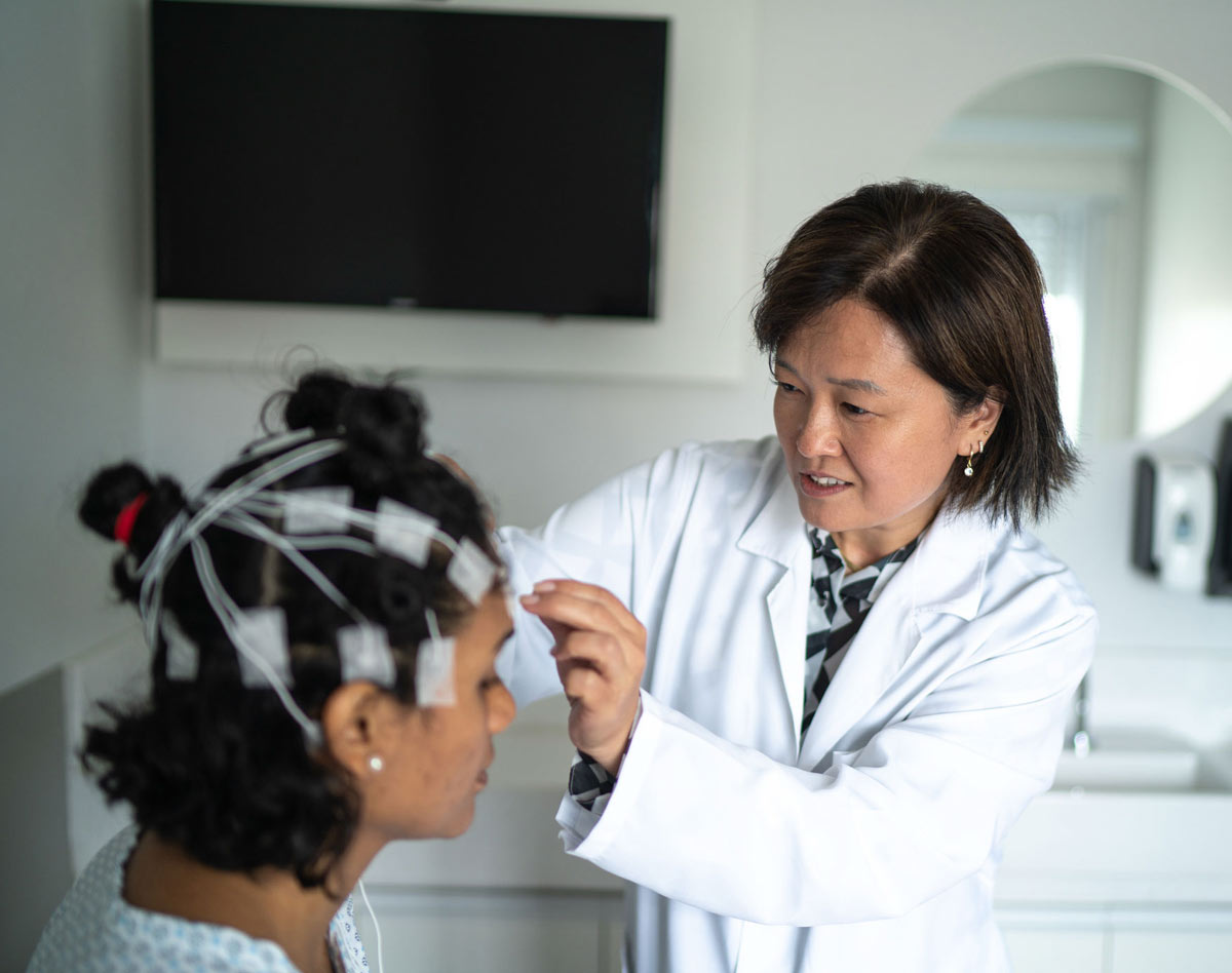 doctor conducting sleep study