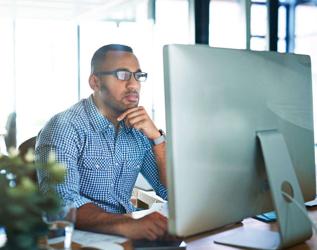 man working at computer