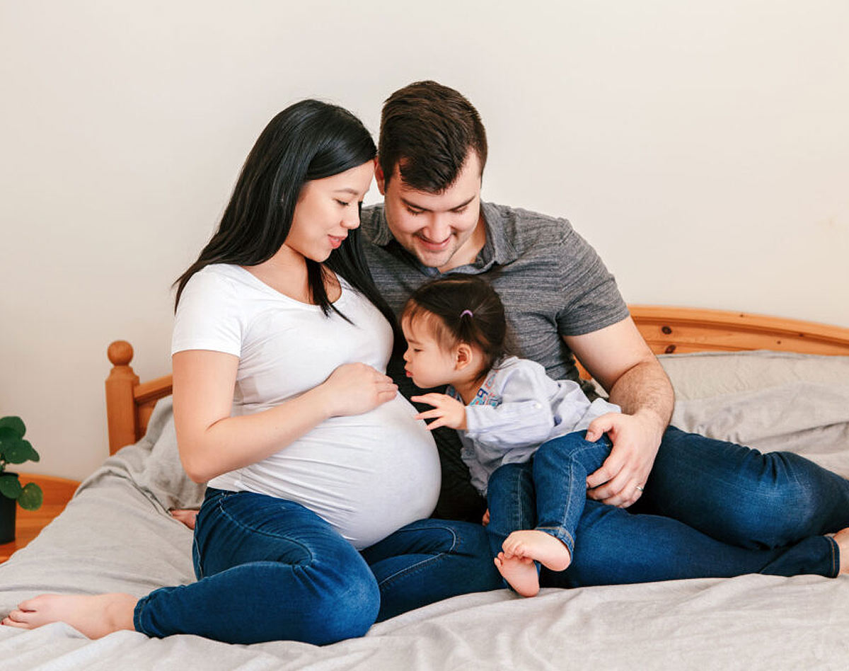 pregnant woman with her family