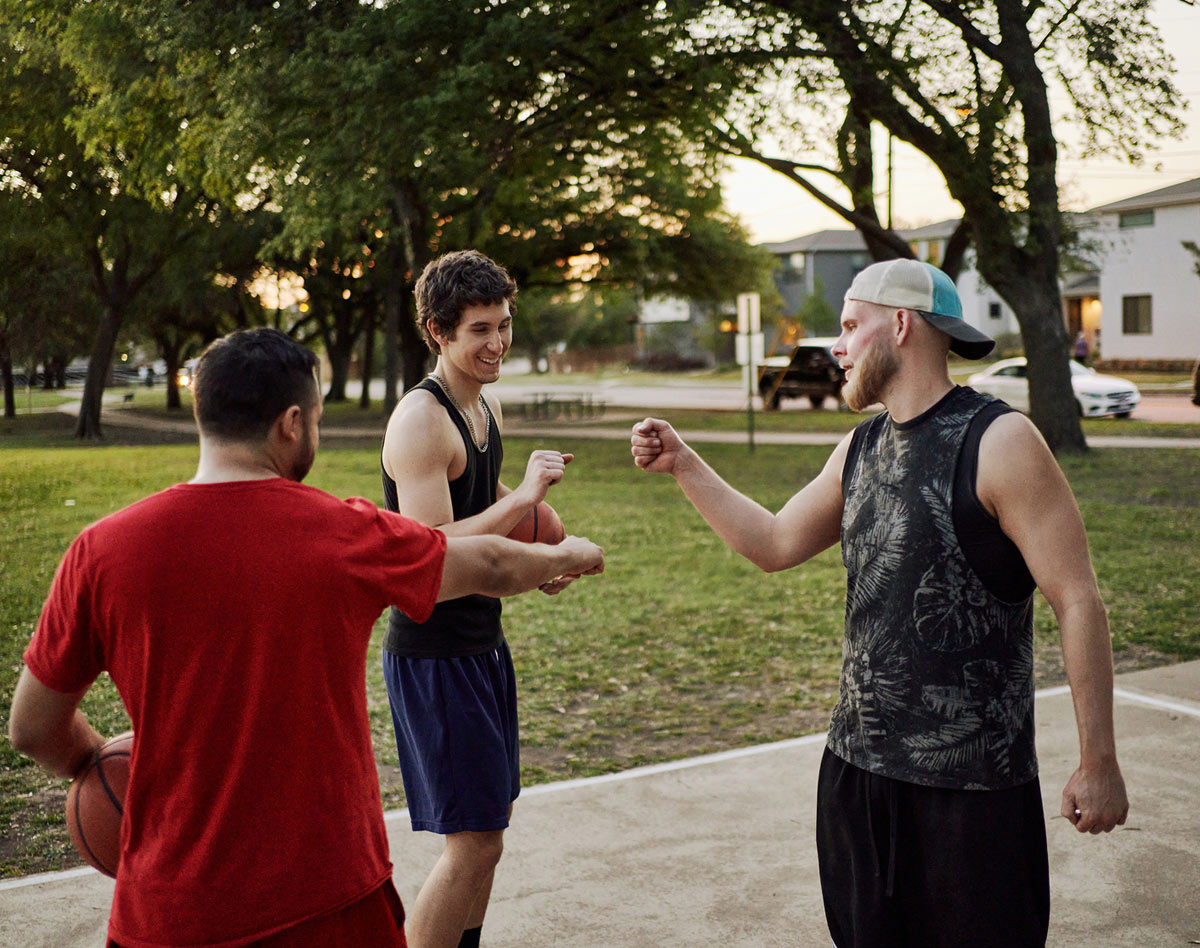 group playing basketball